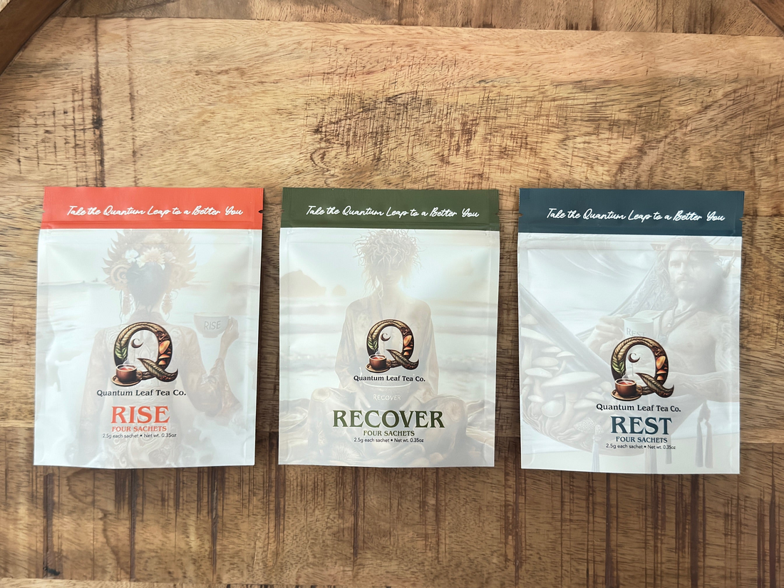 A picture of three mini bags of tea of the Rise blend, Recover blend and Rest blend on a wooden table.